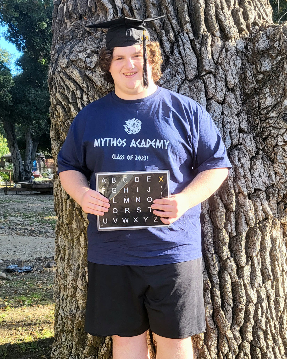 Aydan with a graduation cap