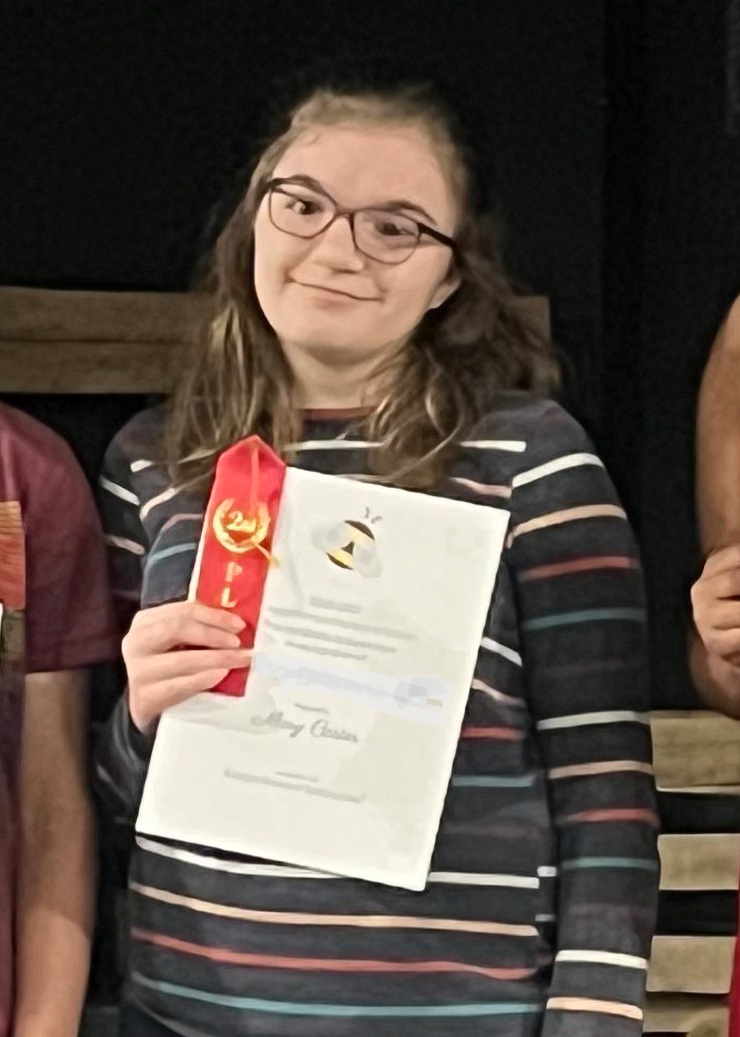 Poppy with her second place ribbon