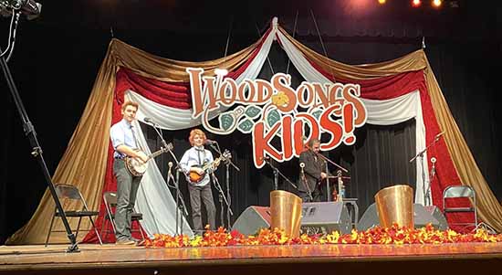 Ayden and Blane Young prep for a performance on a television show featuring local talent.