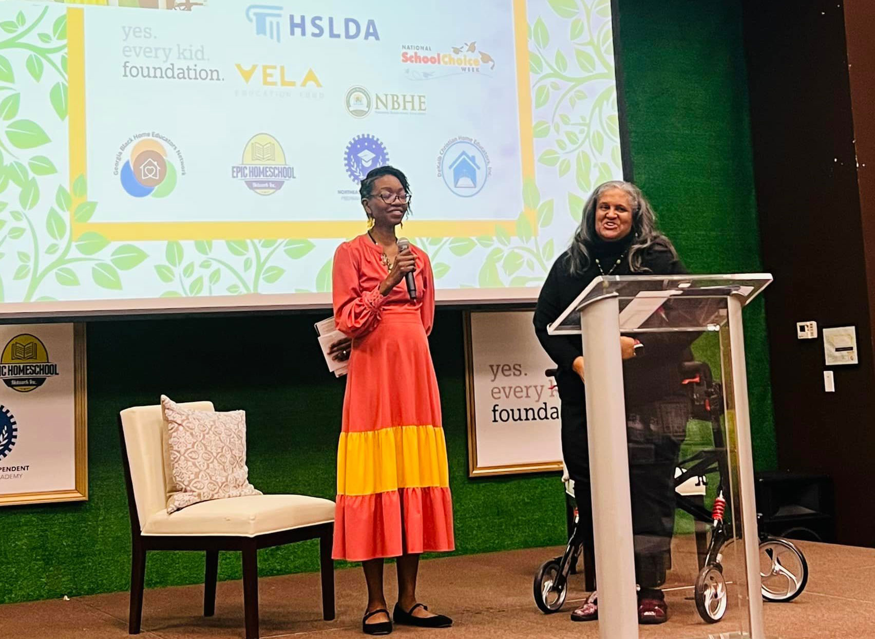 Conference organizer Nicole Doyle introduces the keynote speaker, Cheryl Ann Fields.
