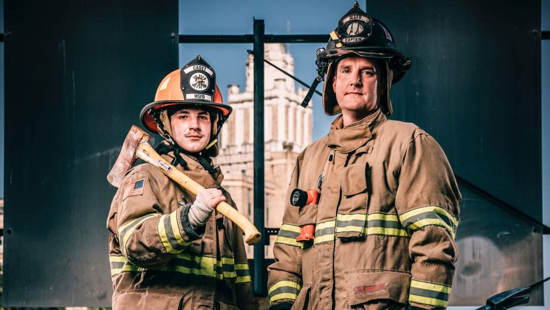 Jason and Jaxon in their firefighter gear