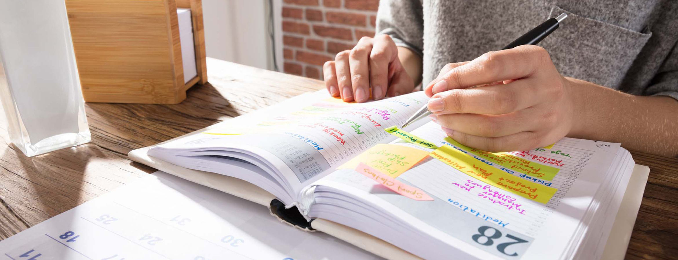 parent with calendar and planner