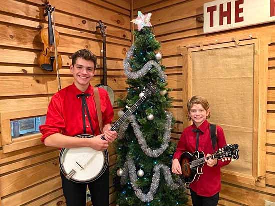 Ayden and Blane Young perform Christmas songs.