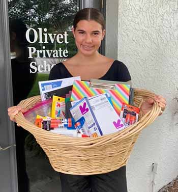 Mallory Cunningham with school supplies.