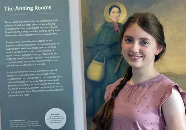 Nika poses beside a favorite painting at an art museum.